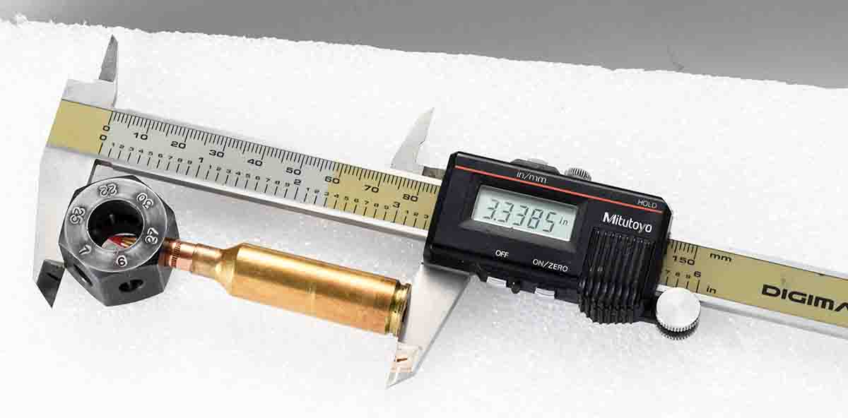 Here the Brownells hex nut device is used to measure from the ogive of a .270 WSM dummy round with a Hornady 140-grain SST bullet.